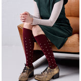 Tightology Dotty Merino Wool Socks in burgundy with colorful dot pattern, cozy and comfortable for everyday wear