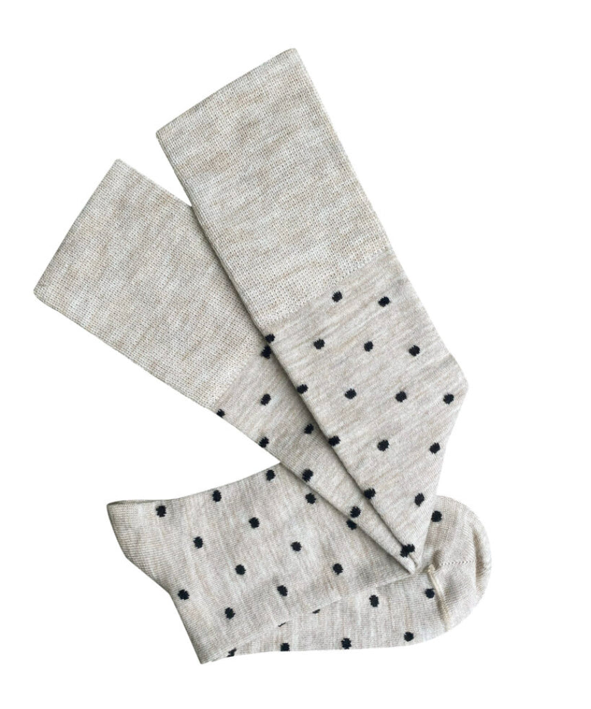 Tightology Dotty Merino wool socks with a colorful marble dot pattern, soft and warm for comfortable wear.
