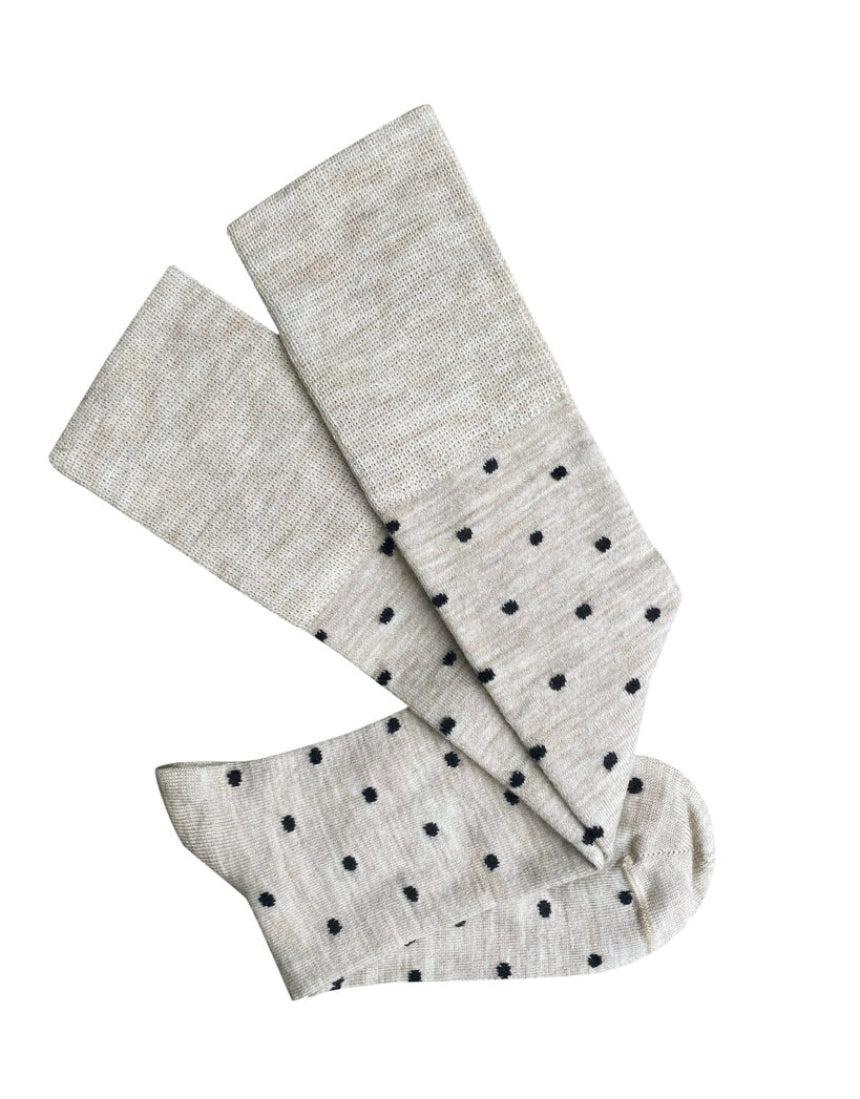 Tightology Dotty Merino wool socks with a colorful marble dot pattern, soft and warm for comfortable wear.
