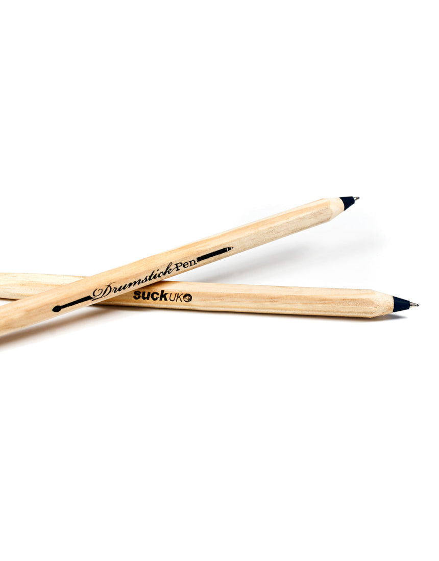 Black drumstick-shaped pen by Suck UK, featuring realistic detailing and a playful, musical-inspired design.