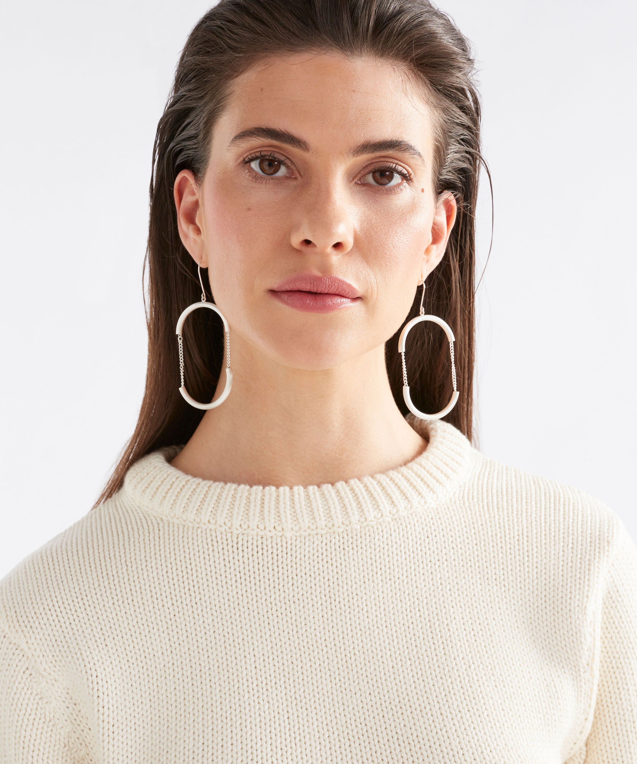 Gold Elk Skara Earrings, stylish hoop earrings with a sleek design, featuring smooth gold finish.
