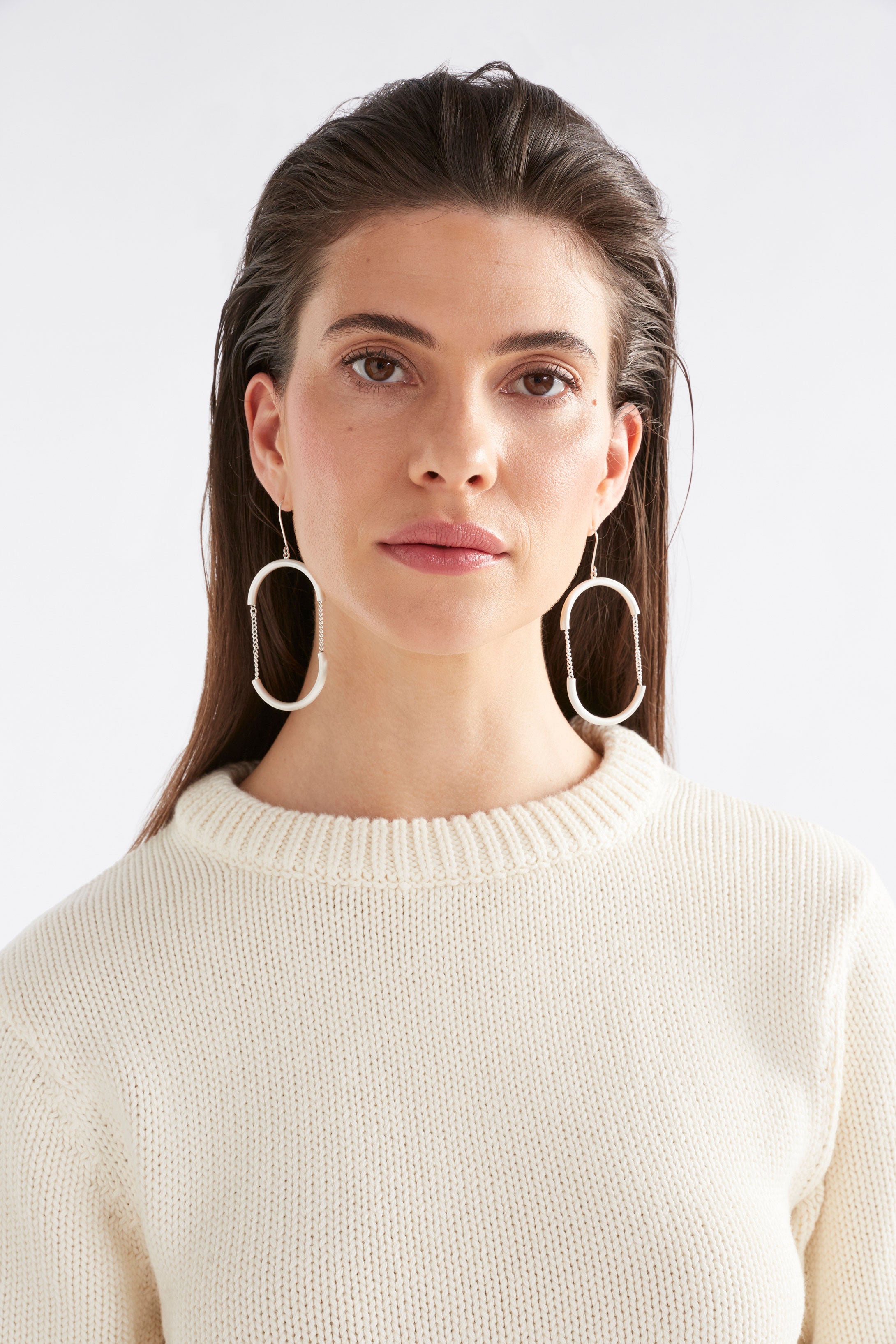 Gold Elk Skara Earrings, stylish hoop earrings with a sleek design, featuring smooth gold finish.