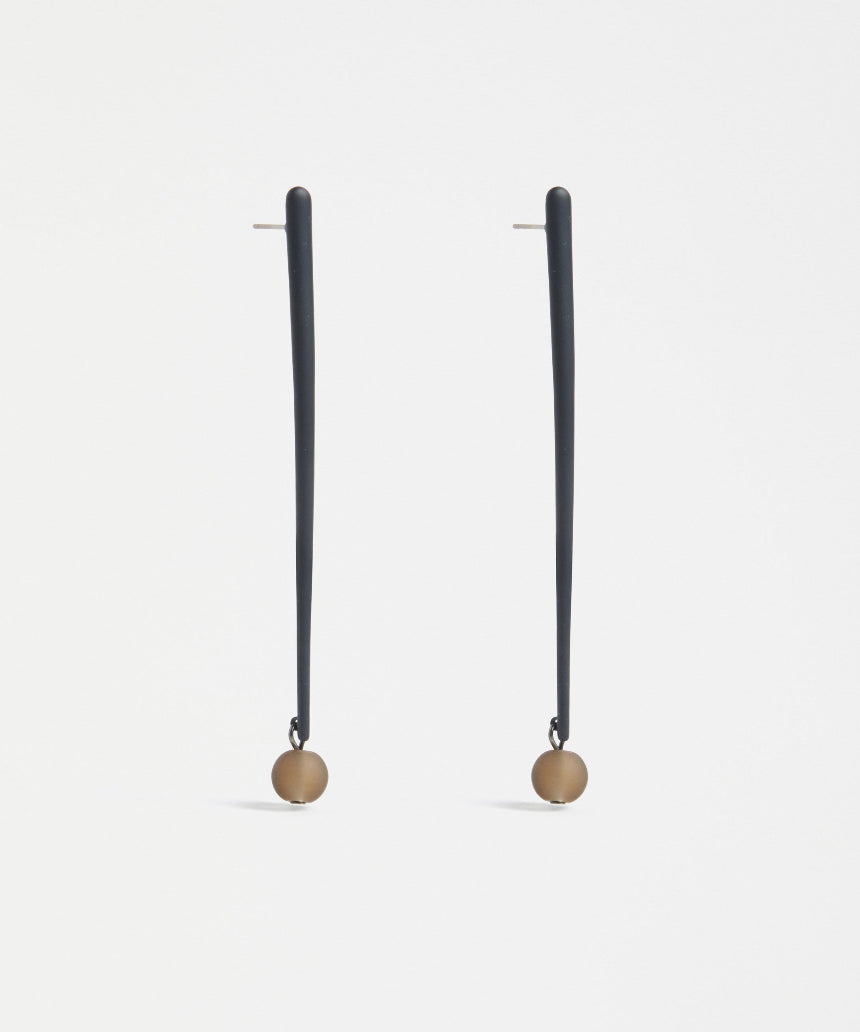 Elk Kyna Zinc earrings featuring sleek, minimalist design with silver-tone finish, hanging from delicate hooks.