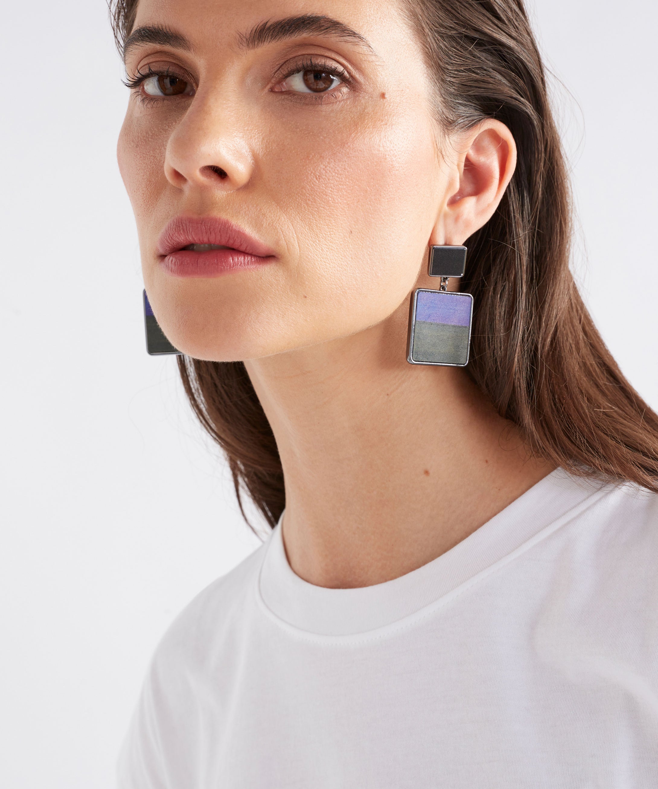 Elk Brikka Cobalt earrings featuring sleek, modern design with cobalt blue accents and silver hooks, displayed on a white background.