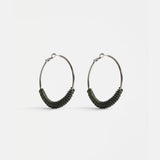 Dark olive Vrid hoop earring by Elk, showcasing a sleek, circular earring with a modern, minimalist design.