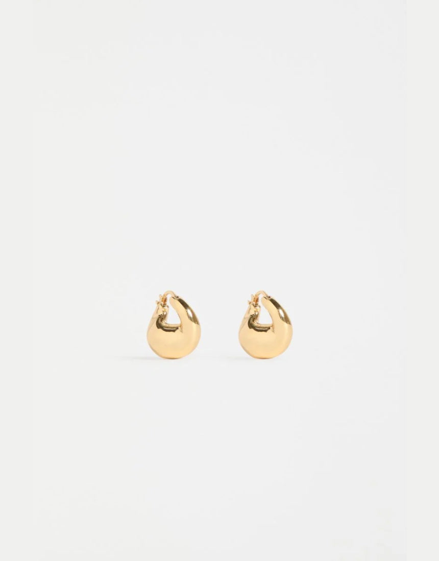 Gold Elk Aisem Mini Hoop Earrings shown on model, featuring small, stylish hoop design perfect for everyday wear.