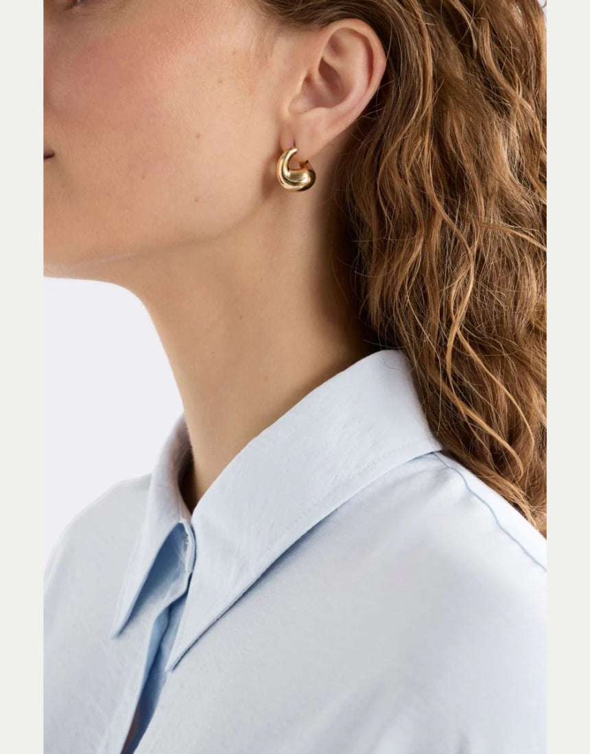 Gold Elk Aisem Mini Hoop Earring showing a small, stylish hoop with a smooth finish on a plain background.