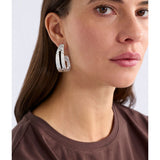 Silver Amner large hoop earring by ELK The Label, showcasing a sleek, polished hoop design with a modern, minimalist style.