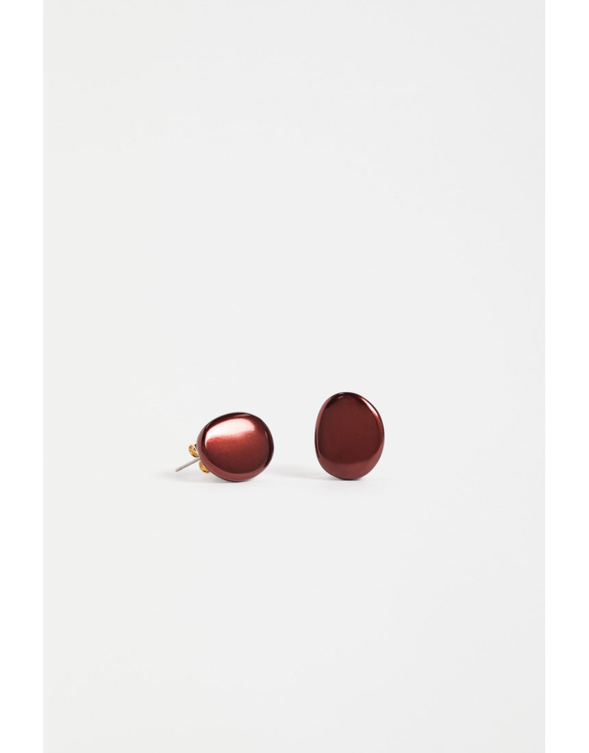 ELK The Label Atur Mini Stud Earring in Espresso, small gold-tone earring with a minimalist design, close-up view.