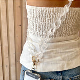 Clear Capri phone strap accessory by Salty Safari featuring a sleek, transparent design for secure phone handling.