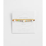Estella Bartlett rainbow pearl bracelet set featuring colorful pearl bracelets with silver accents on a white background.