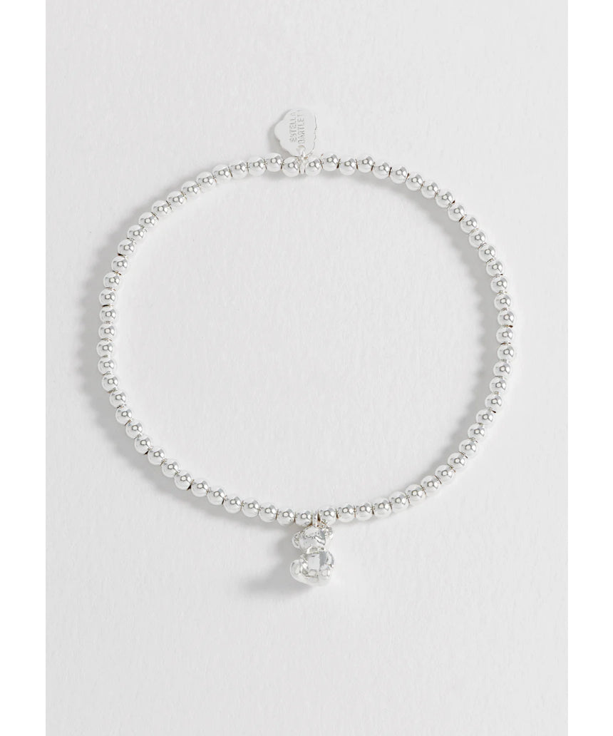 Estella Bartlett beaded Teddy Bear charm bracelet with colorful beads and silver-tone chain, featuring a cute teddy bear pendant.
