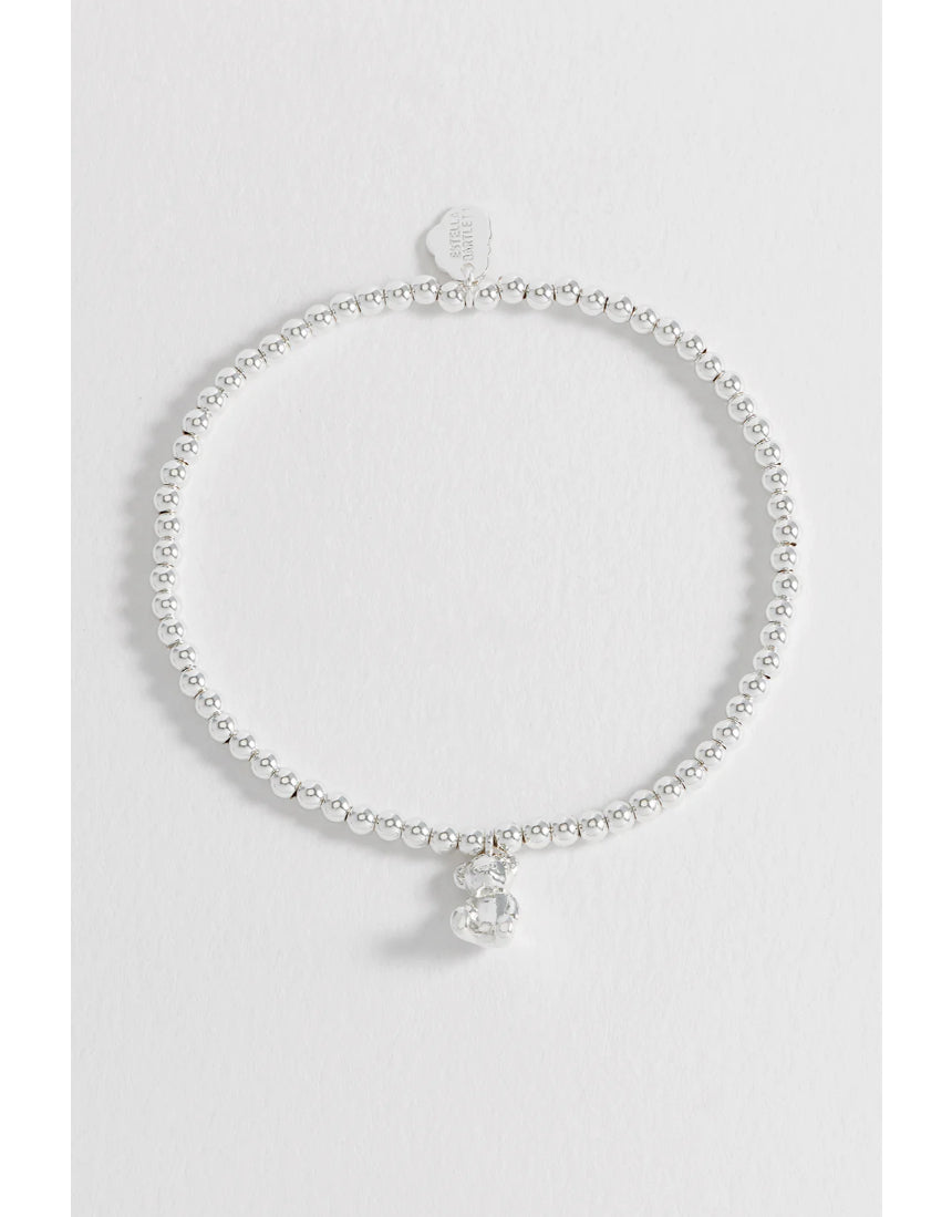 Estella Bartlett beaded Teddy Bear charm bracelet with colorful beads and silver-tone chain, featuring a cute teddy bear pendant.