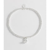 Estella Bartlett beaded Teddy Bear charm bracelet with colorful beads and silver-tone chain, featuring a cute teddy bear pendant.