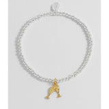 Estella Bartlett Champagne Sienna bracelet with delicate chain and gemstone accents, showcasing elegant jewelry design.