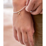 Estella Bartlett Champagne Sienna bracelet featuring a delicate chain and elegant gemstone accents.