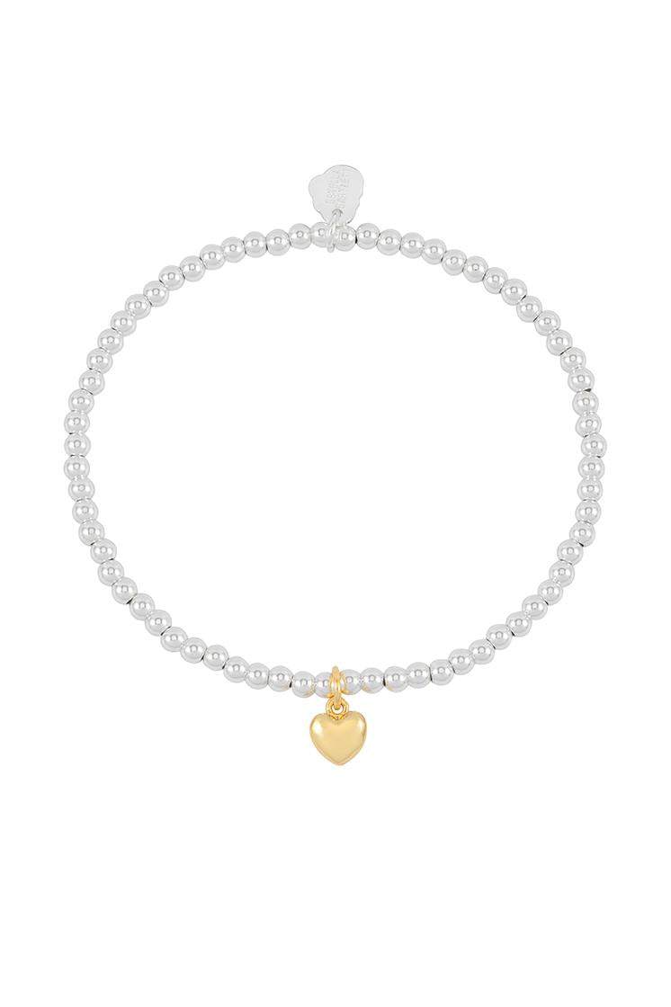 Gold-plated Estella Bartlett puffed heart Sienna bracelet with delicate chain design and charming heart detail.