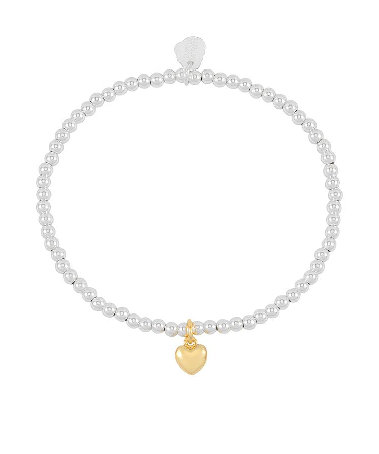 Gold-plated Estella Bartlett puffed heart Sienna bracelet with delicate chain design and charming heart detail.