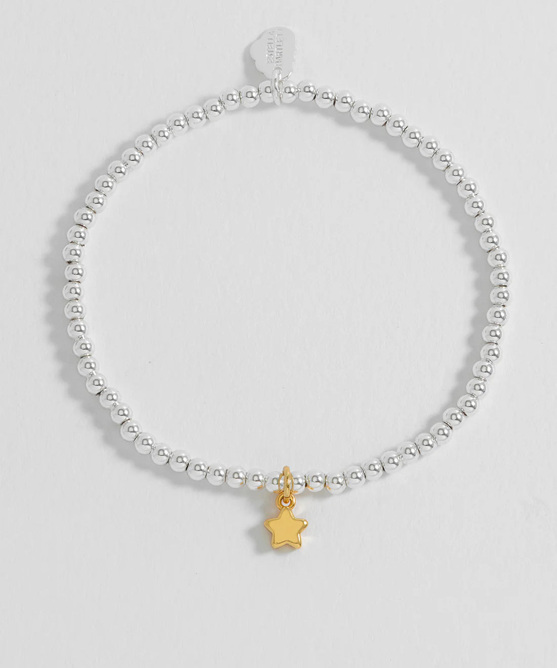 Estella Bartlett puffed star Sienna bracelet with gold-tone finish, featuring a star charm and delicate chain design.