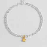 Estella Bartlett puffed star Sienna bracelet with gold-tone finish, featuring a star charm and delicate chain design.