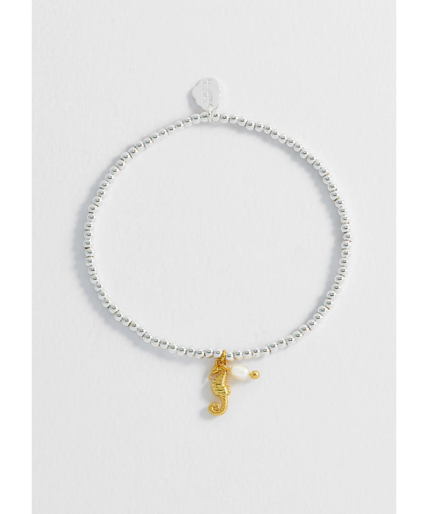 Estella Bartlett Seahorse and Pearl Sienna bracelet featuring a delicate seahorse charm and pearl accents on a slender chain.