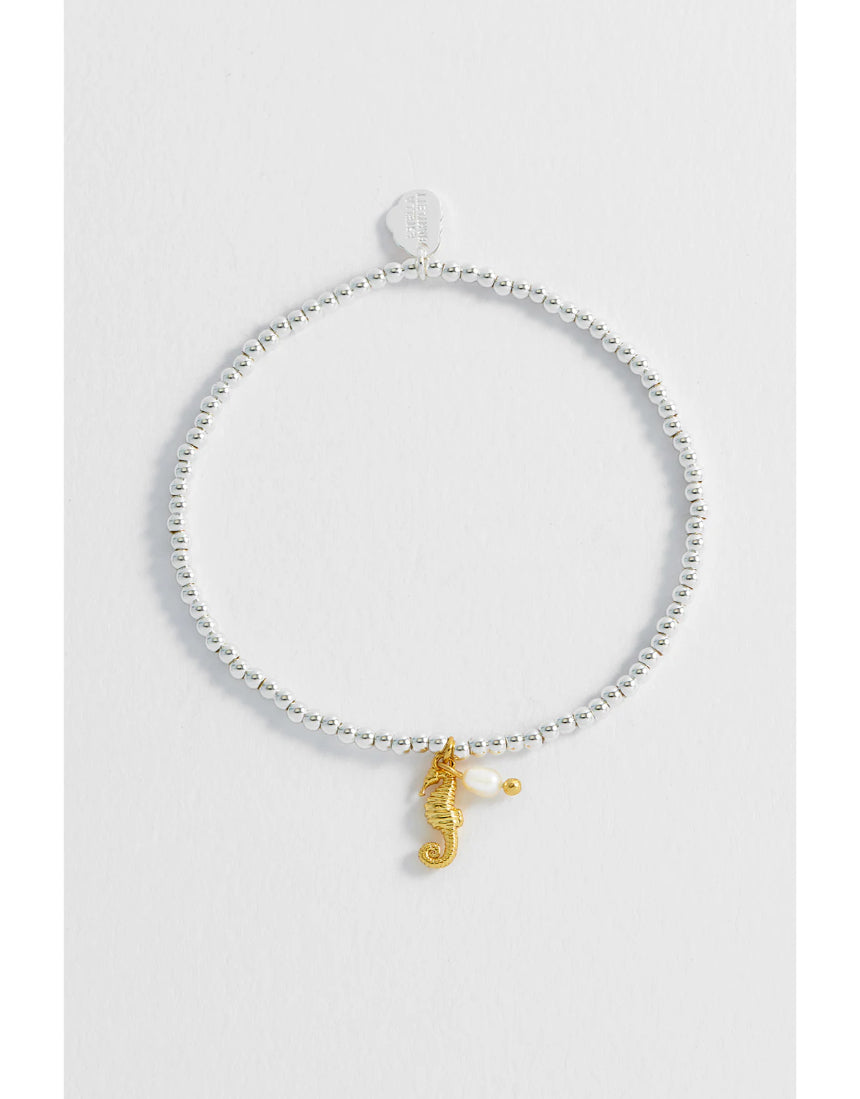 Estella Bartlett Seahorse and Pearl Sienna bracelet featuring a delicate seahorse charm and pearl accents on a slender chain.