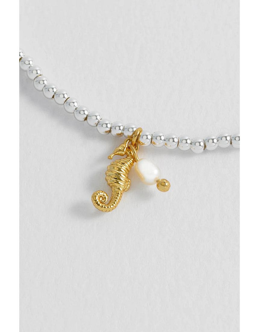 Estella Bartlett Seahorse and Pearl Sienna bracelet featuring a delicate seahorse charm and pearl accents on a silver chain.