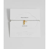 Estella Bartlett Seahorse and Pearl Sienna bracelet featuring a seahorse charm and white pearls on a delicate chain.
