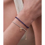 Estella Bartlett seahorse and pearl Sienna bracelet featuring a delicate charm and elegant design on a fine chain.