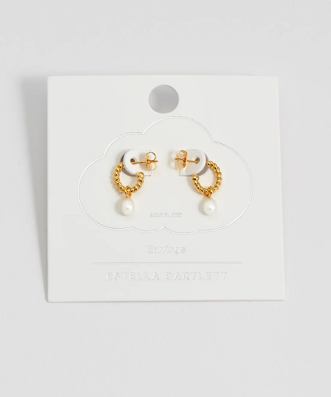Estella Bartlett pearl drop and twist hoop earrings with elegant design, featuring pearl accents and silver-tone hoops.