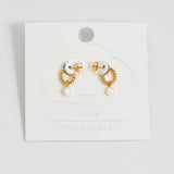 Estella Bartlett pearl drop and twist hoop earrings with elegant design, featuring pearl accents and silver-tone hoops.