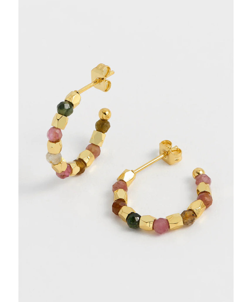 Gold hoop earrings by Estella Bartlett featuring coco and tourmaline gemstones, stylish and elegant jewelry accessory.