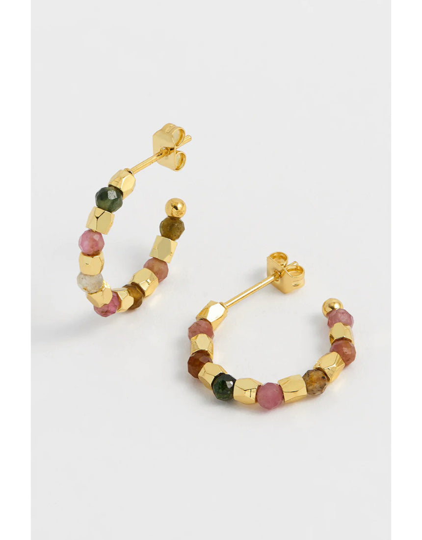 Gold hoop earrings by Estella Bartlett featuring coco and tourmaline gemstones, stylish and elegant jewelry accessory.
