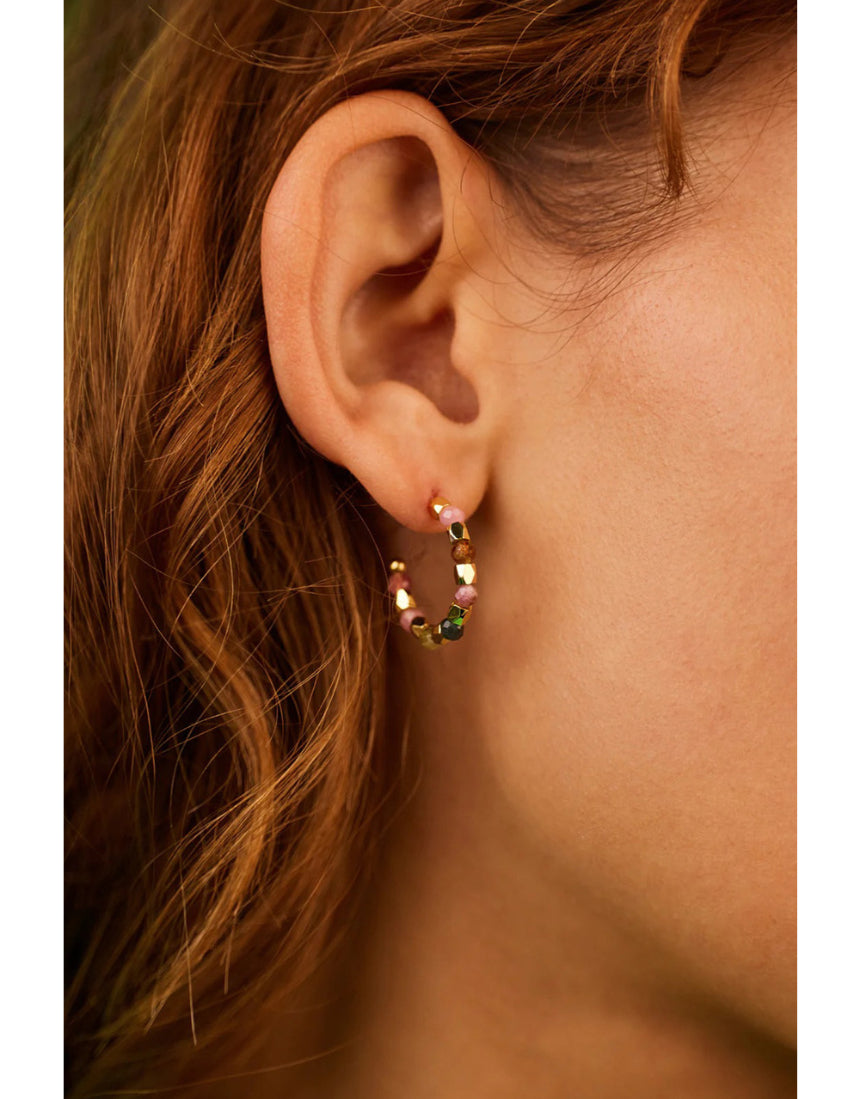 Gold hoop earrings by Estella Bartlett featuring Coco and Tourmaline stones, elegant jewelry for everyday wear.