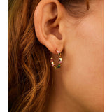 Gold hoop earrings by Estella Bartlett featuring Coco and Tourmaline stones, elegant jewelry for everyday wear.