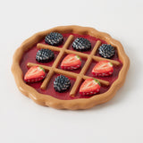 Decorative Pilbeam Living Strawberry & Blackberry Tart Noughts and Crosses game with colorful fruit-themed design for home decor or play.