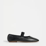 Black Elk Kuren flat shoes with sleek design and comfortable fit, featuring smooth leather material and simple slip-on style.