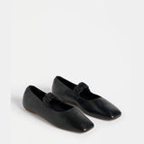 Black Elk Kuren flat shoes with sleek design and rounded toe, perfect for casual and everyday wear.