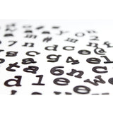 Suck UK fridge fonts magnets set with colorful letter and number magnets on a white background.