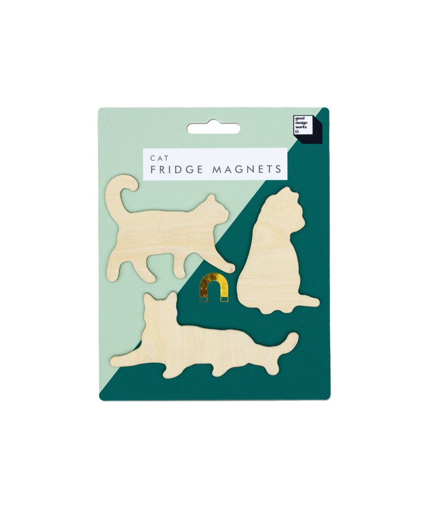 Colorful Suck UK fridge magnets featuring playful cat designs, perfect for decorating and organizing your kitchen space.