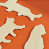 Set of Suck UK fridge magnets featuring colorful, playful cat designs on a white background.