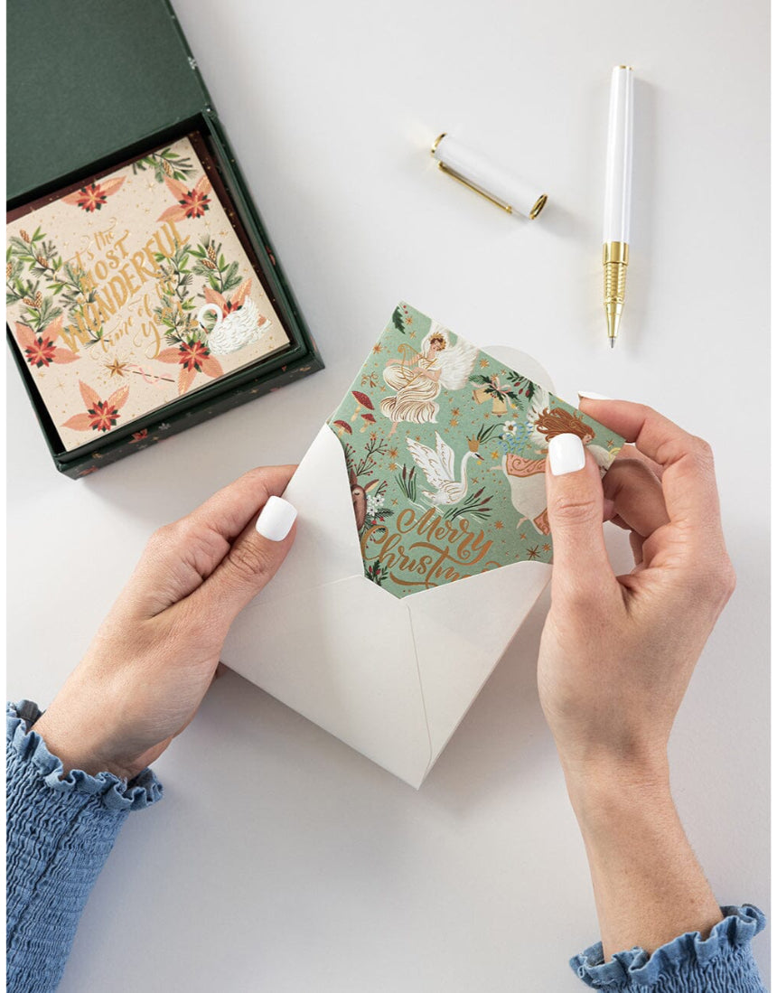 Set of 12 Bespoke Letterpress Christmas greeting cards in a square box, featuring festive designs for holiday notes.
