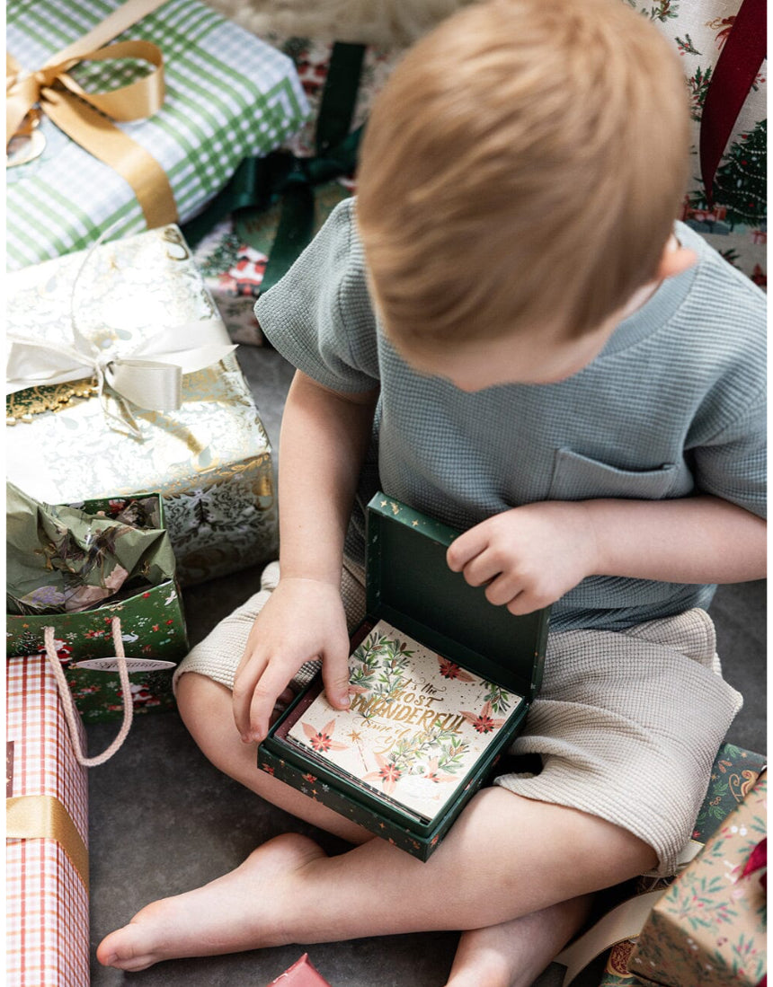 Bespoke Letterpress 12-pack Christmas greeting cards in a square boxset featuring festive design for holiday wishes.