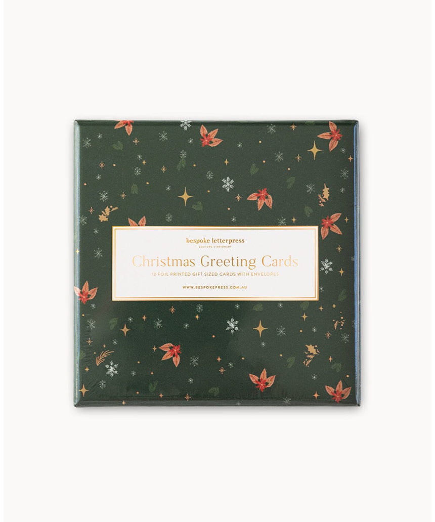 Bespoke Letterpress Christmas greeting card boxset featuring 12 small square cards with festive holiday designs.
