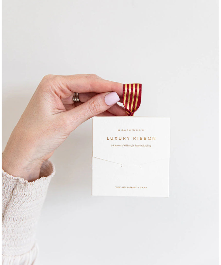 Red and gold foil striped ribbon from Bespoke Letterpress, 10 meters of high-quality decorative ribbon for craft and gift wrapping.