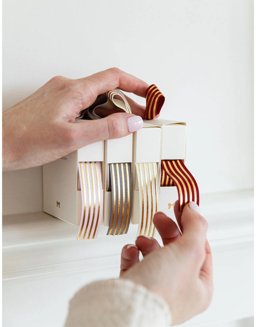 Red and gold foil striped ribbon from Bespoke Letterpress, 10 meters, showcasing elegant, high-quality decorative ribbon.