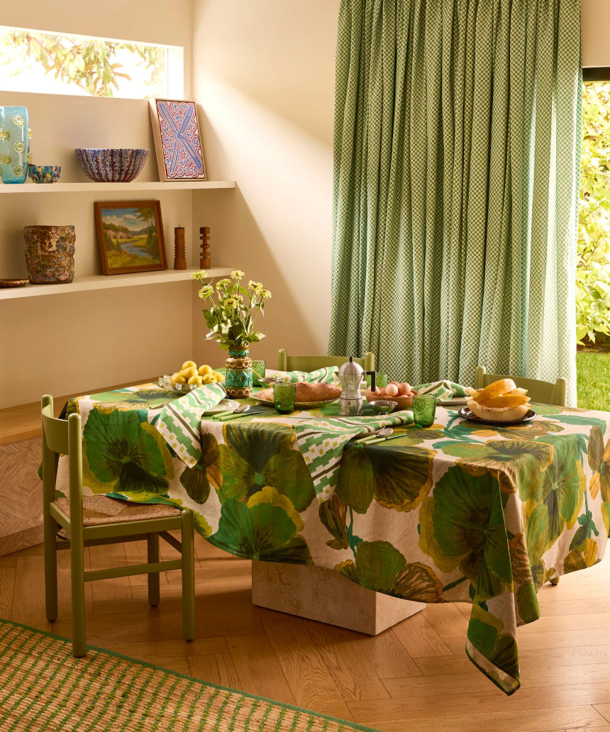 Bonnie and Neil Gem Green glass tumbler with a smooth surface, styled for dining or everyday use.