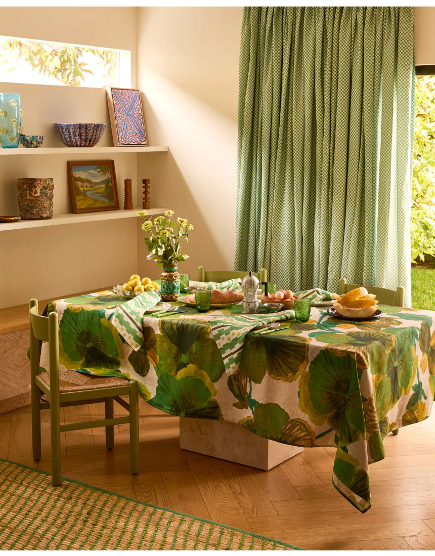 Bonnie and Neil Gem Green glass tumbler with a smooth surface, styled for dining or everyday use.