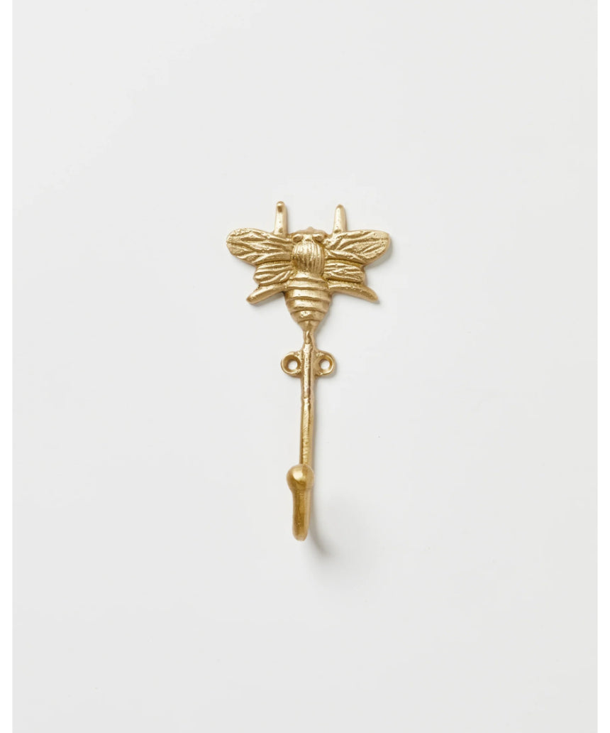Brass bees wall hook by Bonnie and Neil with detailed bee design, mounted on a wall for decorative organization.