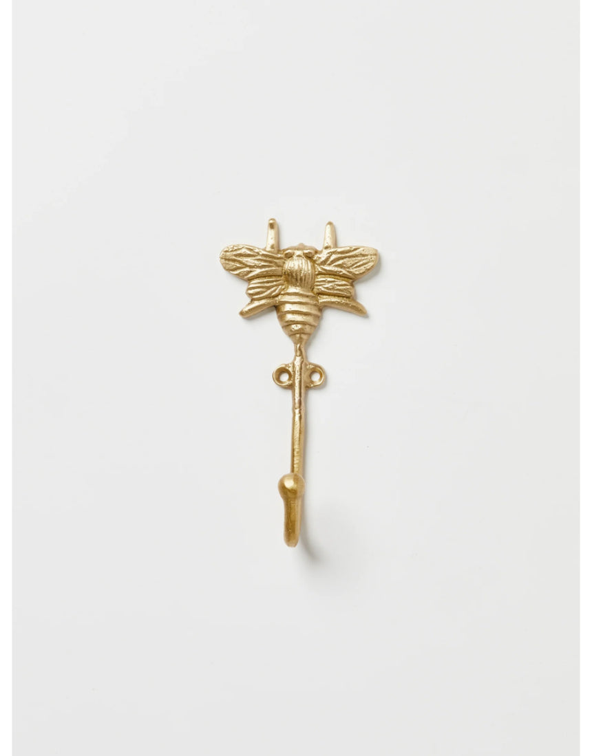 Brass bees wall hook by Bonnie and Neil with detailed bee design, mounted on a wall for decorative organization.